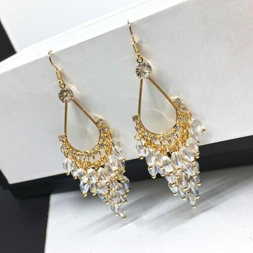 Fashionable luxury crystal tassel earrings with Bohemian handmade rice bead long vertical earrings for ladies banquet jewelry