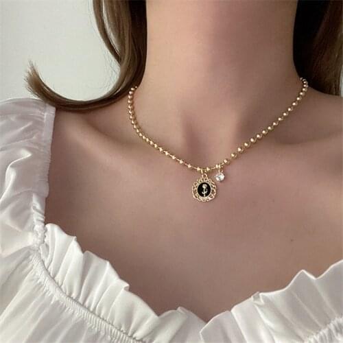 AOMU Vintage Gold Color Black Metal Enamel Lace Flower Necklace Irregular Geometric Hollow Beaded Clavicle Chain for Women Gifts