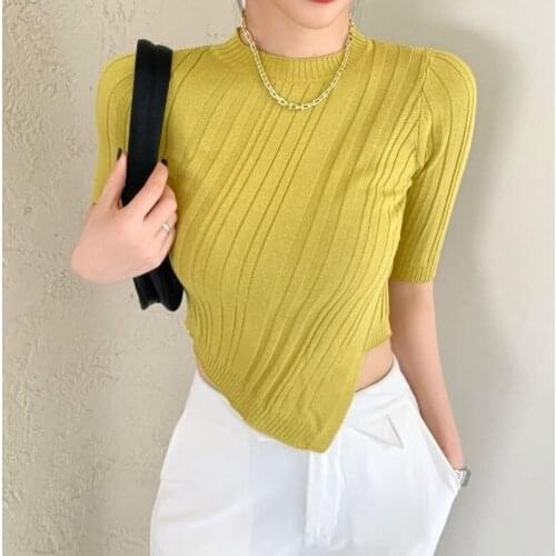 Five-point short-sleeved ice silk knitwear women design sense 2021 new mid-sleeve slim body irregular short jacket tide
