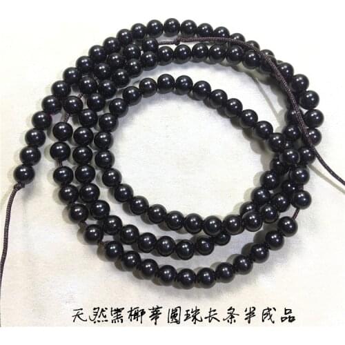 108 Buddha beads in natural Indonesian black gold and coconut base