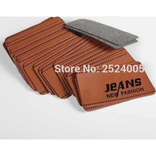 Jeans label PU leather label clothing main label 100 pcs a lot