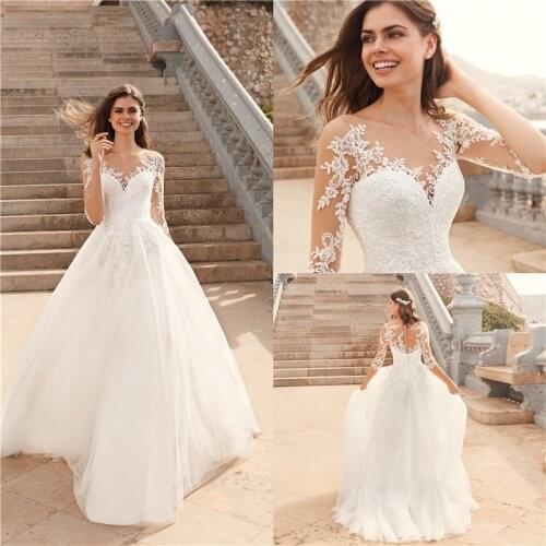 Long Sleeve Vestido De Noiva Wedding Dresses Illusion Neckline White Ivory Bridal Dresses Floor Length Tulle Gowns
