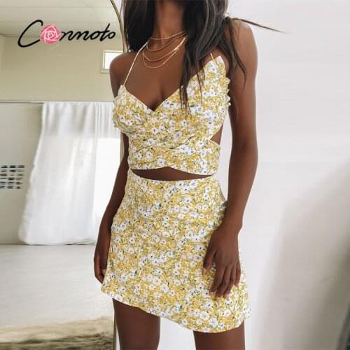 Conmoto Sexy floral print backless cross lace up dresse Summer hollow out halter yellow dress Holiday beach boho dress woman