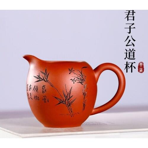 Yixing famous tea is pure handmade high-end violet arenaceous points zhu tea sea mud carved painting gentleman fair mug