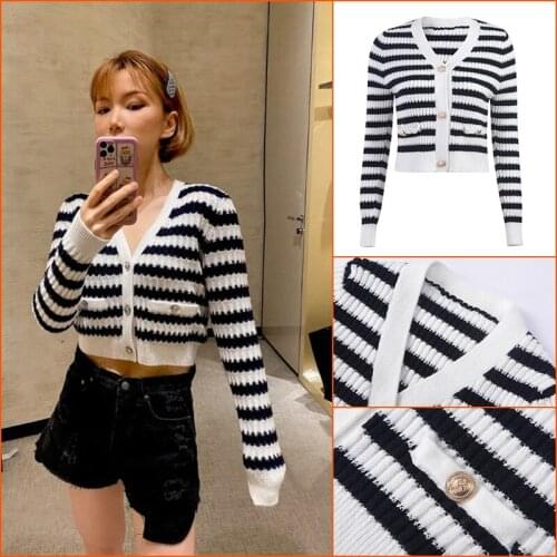 Early spring new black and white stripe short knitted cardigan coat elegant temperament V-neck bottomed sweater womens sweater
