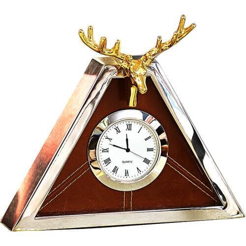 Modern high-end clock European living room metal triangle creative table clock shell deer clock pendulum table new products