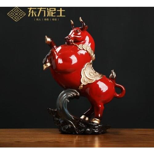 The east mud "unstoppable" furnishing articles ceramic cow office desktop decoration shop opening gifts