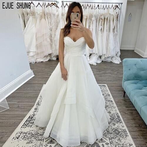 JUE SHUNG Simple Strapless Wedding Dresses A Line Organza Lace Up Back Cheap White Pleat Tiered Bridal Dresses Wedding Gowns