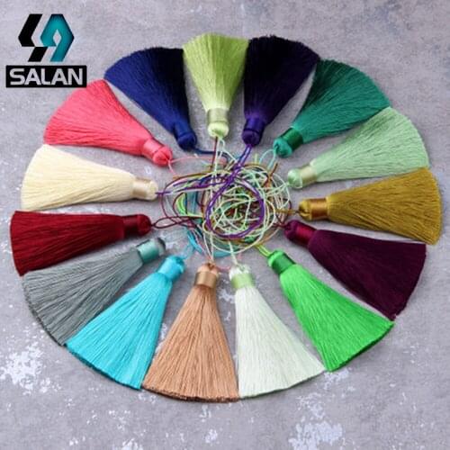 The new multi - color artificial silk small tassel hanging ear phone chain ancient wind accessories high - grade tassel pendant