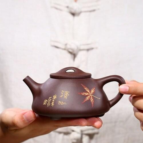 On big sales Chinese real yixing zisha dicaoqing clay marked tea pot leaf print marked shipiao handmade classical 9 infuser hole