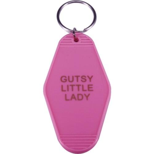 Vintage inspired light pink hotel key tag with gold lettering, Gutsy Little Lady