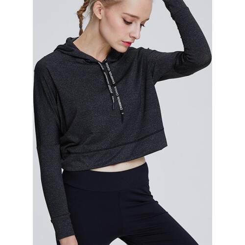 New autumn/winter in Europe and the hooded head set is pure color fleece motion wind hot style short navel coat