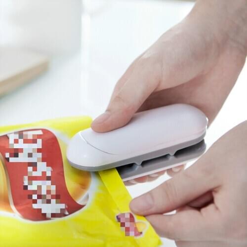 Portable mini plastic packaging machine, snack plastic bag, food preservation and sealing artifact