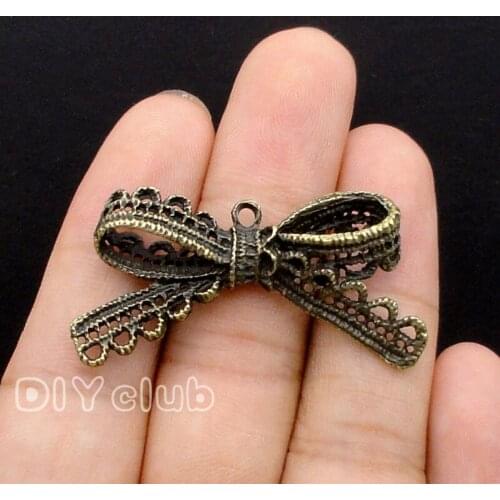 20pcs-Antique Bronze Lace Edges Bowknot Bow Tie Knot Charm Pendant 44x22mm