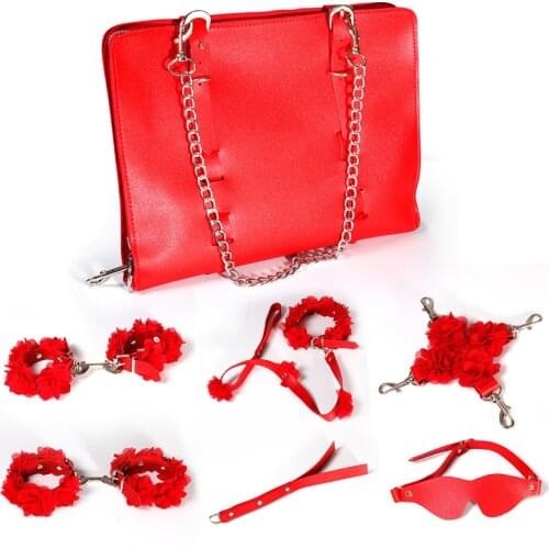 Sexy Leather BDSM Sex Toy Set Sex Bondage Set Handcuffs Shackles Collar Blindfold Cross Buckle Whip Flower Storage Bag