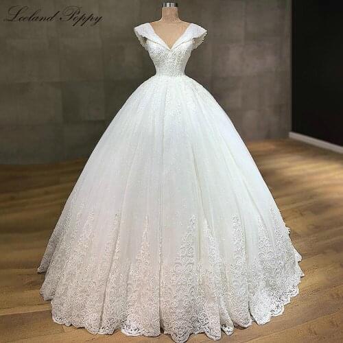 Lceland Poppy A-line O-Neck Shiny Wedding Dresses 2021 Short Sleeves Lace Appliques Floor Length Vestido de Novia Bridal Gowns