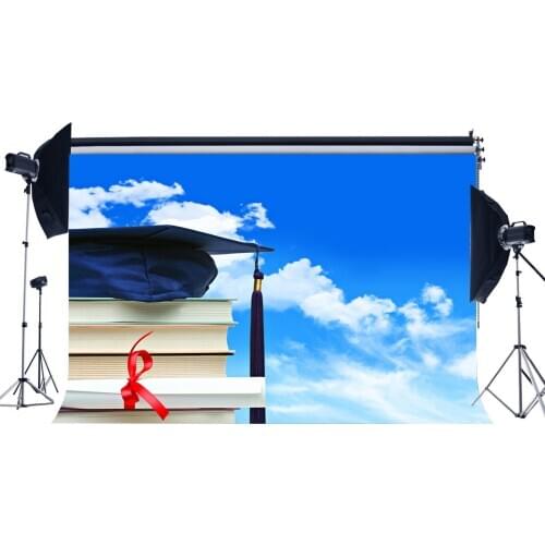 Graduation Ceremony Backdrop Degrees Diploma and Trencher Cap Backdrops Books Blue Sky White Cloud Background