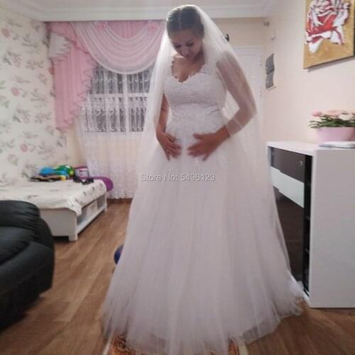 Ball Gowns Spaghetti Strap Tulle Wedding Dresses Lace Applique Pearls Bridal Dress Floor Length Corset Back Marriage Bride Dress