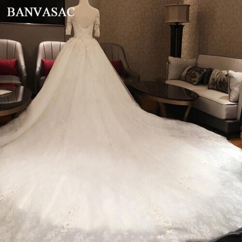 BANVASAC 2018 V Neck Half Sleeve Flowers Ball Gown Wedding Dresses Lace Appliques Real Photos Cathedral Train Bridal Gowns