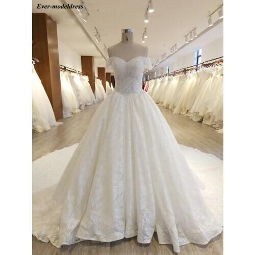 Luxury Sparkly Lace Wedding Dress 2021 Off Shoulder Lace-up Back Pearls Chapel Train Bride Dresses Wedding Gown Vestido De Noiva