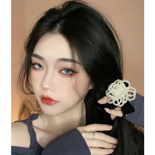 South Korea is sweet and super fairy pearl camellia hair circle female advanced feeling butterfly ligate head rubber band head r