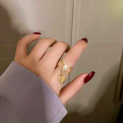 Korean fashion jewelry pearl love portrait open ring temperament design sense of hand ornaments for women