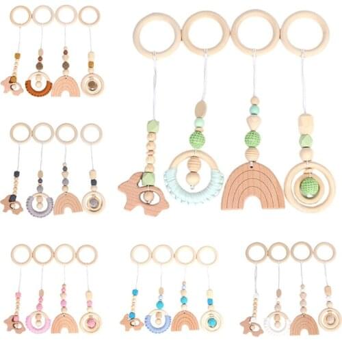 4 Pcs/Set Baby Play Gym Frame Stroller Hanging Pendant Wooden Ring Teether Molar Q1FE