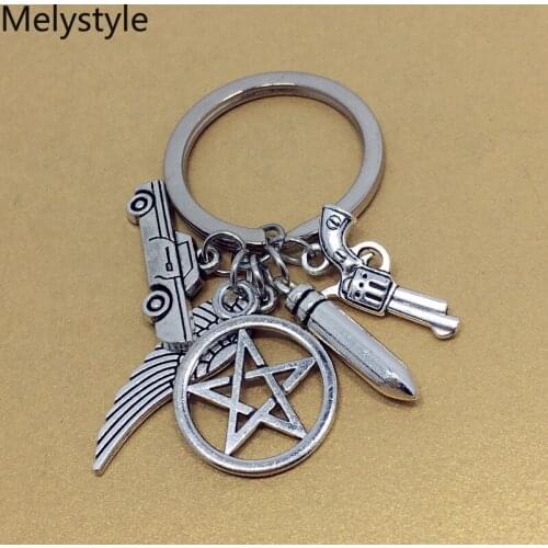2019 Policeman With Guns-Bullets-Angel-wings Pendant Keychain Fashion Jewelry Mens Jewelry Car Key Ring Ring Gift Souvenir