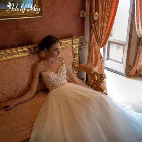 Romantic Sweetheart Neck Tulle Brush Train A-Line Wedding Dress 2020 Luxury Beading Spaghetti Straps Backless Boho Wedding Gown