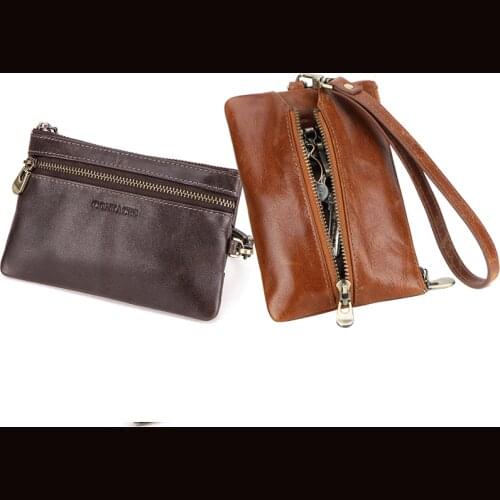 Dual-purpose leather key case with wrist strap, multi-function hand holding trendy key case