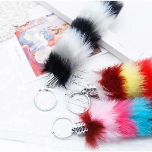 New faux rabbit fur striped tail pendant colorful fur ball cute bag Keychain car plush ornaments wholesale
