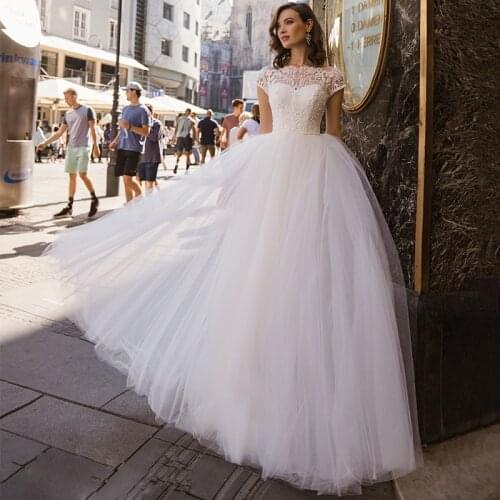 High Quality A-Line Tulle Wedding Dress 2021 Fashion Floor Length Lace Appliques O-neck Short Sleeve Bridal Gowns