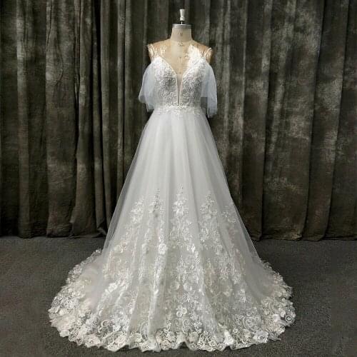 2020 Spaghetti Strap Backless French Floral Lace A Line Church Cathedral Bridal Gown Beach Wedding Dress