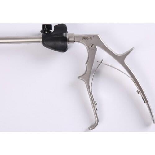 Laparoscopic titanium clip applicator