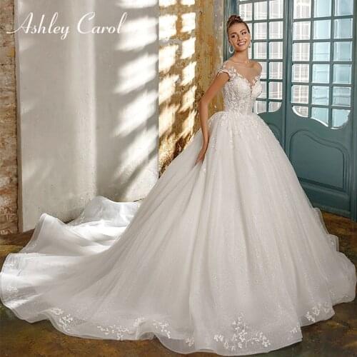 Ashley Carol Ball Gown Wedding Dress 2021 Elegant Backless Scoop Beaded Appliques Short Princess Bridal Gown Vestido De Noiva