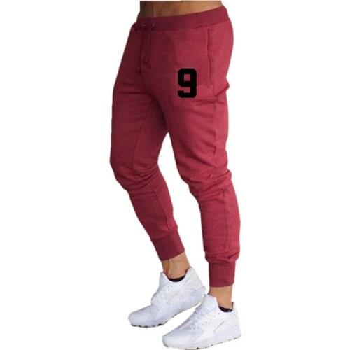 2021 jogging sports pants mens casual tights gym fitness brand track and field pants autumn and winter mens Dragon sports pant