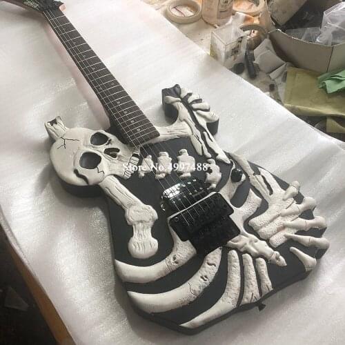 High quality 6 string electric guitar, skull electric guitar, artificial painting, black double rocking bridge, rose wood fingerboard, free delivery