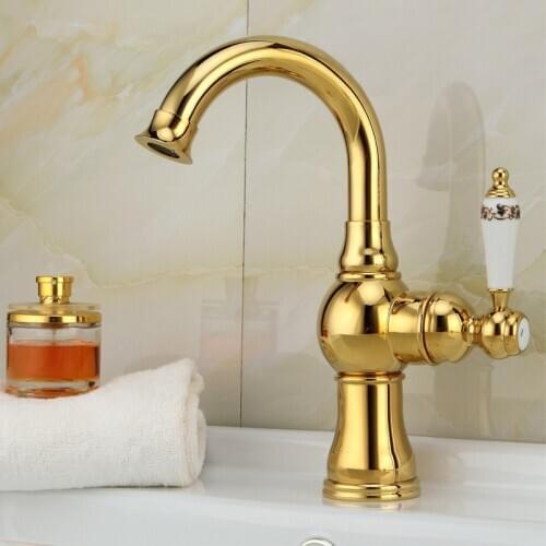 Free Shipping Ceramic handle gold bathroom basin faucet and 360 degree rotation solid brass golden kitchen sink mixer taps
