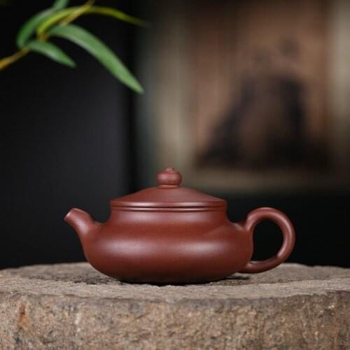 Yixing sell like hot cakes are recommended by hand the original old purple mud flat relapsed make tea pot teapot