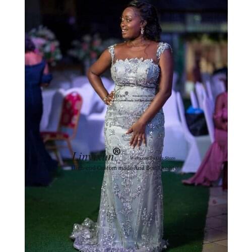 2020 Arabic Aso Ebi Silver Luxurious Sexy Prom Dresses Lace Beaded Sheer Neck Formal Evening Party Gowns Second Reception Gown