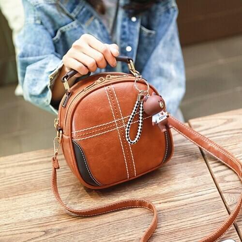 Doll bag 2020 new female bag PU oil leather shell bag messenger bag retro casual cute young female bag lady shoulder bag