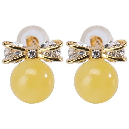 S925 sterling silver gold-plated natural amber beeswax stud earrings personality and fashion bow round beads womens earrings