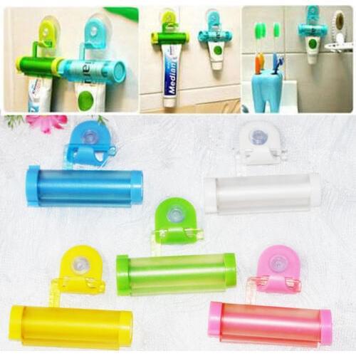 1 PCS Creative Rolling Squeezer Toothpaste Dispenser Tube Partner Sucker Hanging Holde distributeur dentifrice