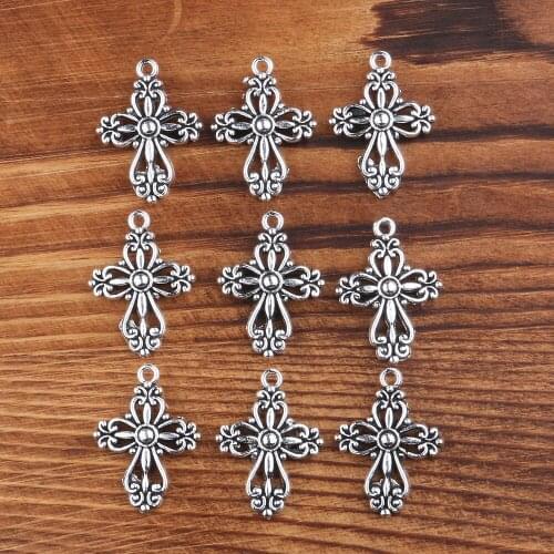 Beautiful hollow cross-shaped metal zinc alloy pendant necklace Retro material pendant DIY necklace pendant jewelry 20*28mm
