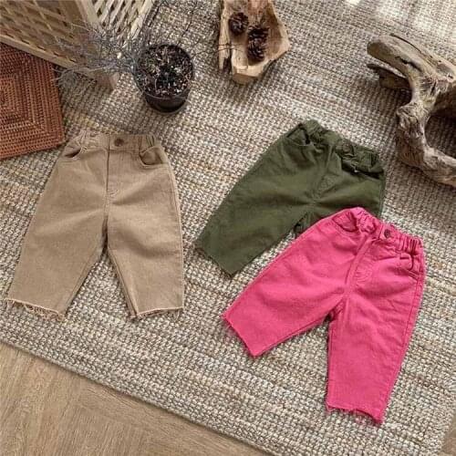 Autumn 2020 new boys and girls simple and personalized raw edge leg casual all-match trousers