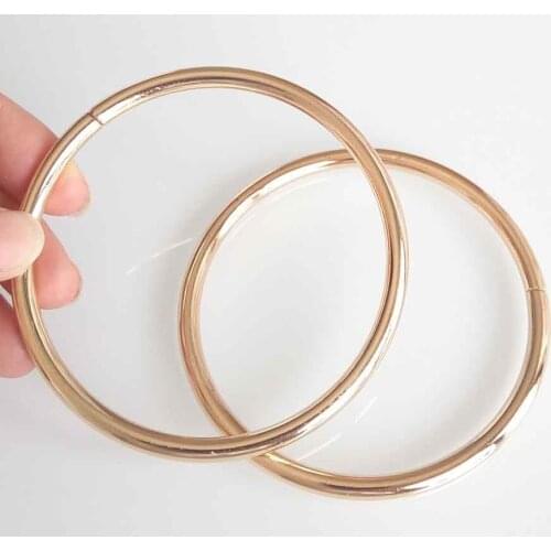 7 cm light gold color metal handle bag, ring