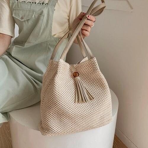 Summer Beach Straw Rattan Shoulder Bucket Crossbody Bags 2021 Simple Luxury Brand Travel Ladies Handbags and Purses Tassel