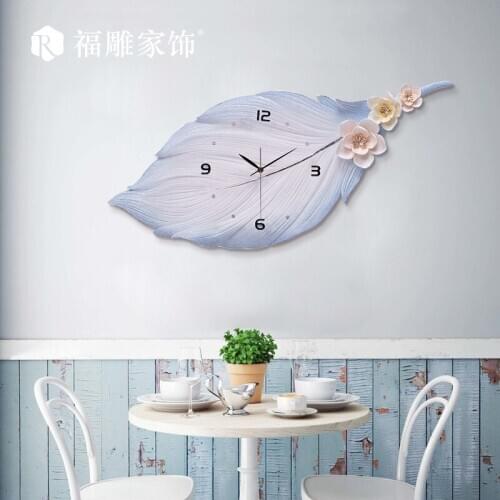 Nordic Living Room Wall Clock Creative Light Luxury Feather Warm Decoration Watch Household Fashion Modern Simple Clock