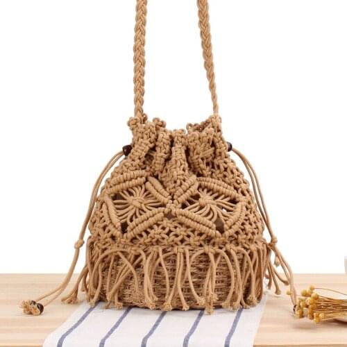 17x22CM New Tassel Bucket Woven Bag Handmade Stitching Hollow Crossbody Straw Bag Holiday Beach Bag a7146