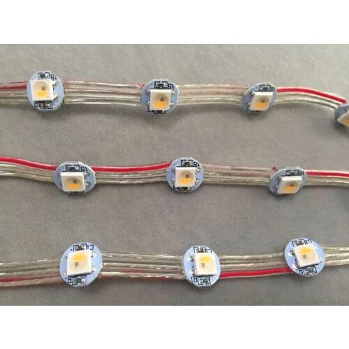 100pcs/string addressable SK6812-RGBW(warm white) led with heatsink(10mm*3mm);DC5V input;5cm wire spacing;with all clear wire